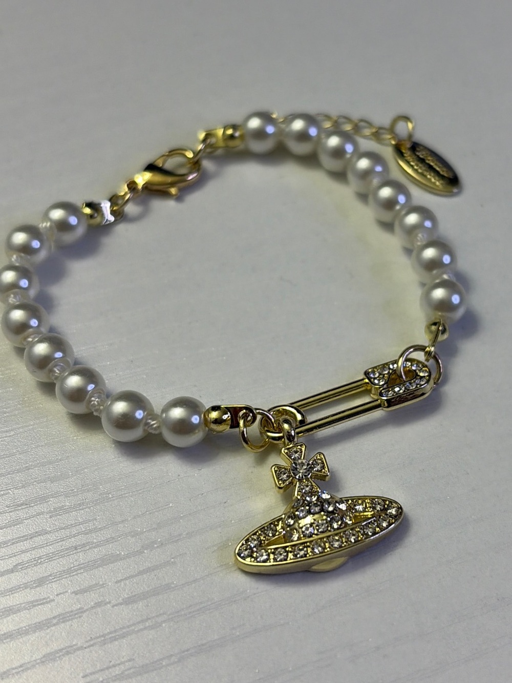 Vivienne Westwood Gold and White Pearl Orb Charm Bracelet